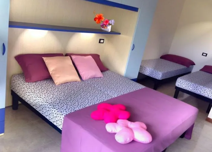 Family By Shops And Sea